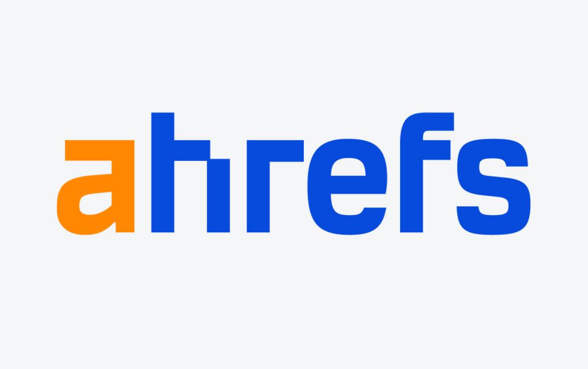 Logo of Ahrefs, featuring the name in lowercase letters with the letters a and f in orange and the rest in blue against a white background.